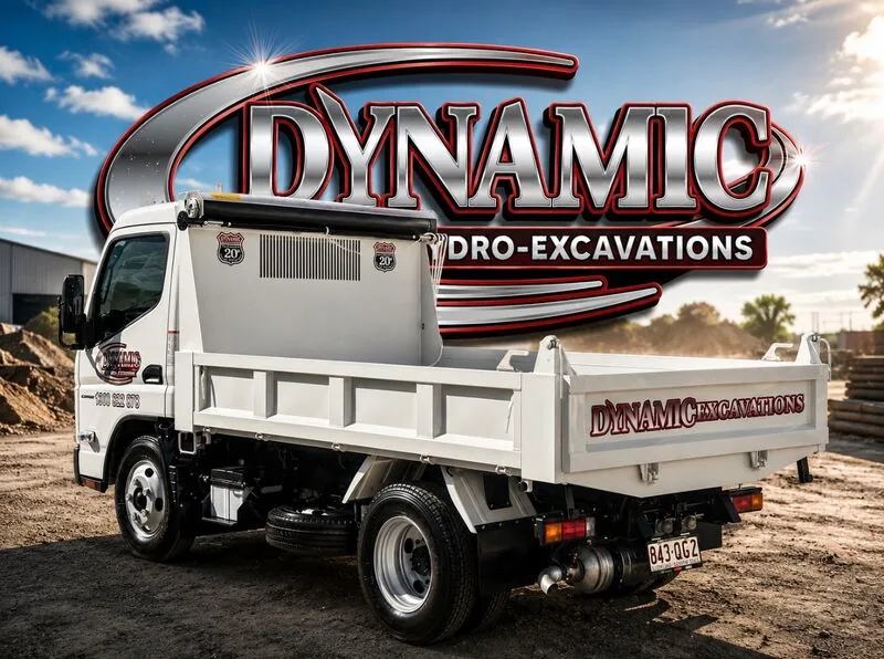 Rear three-quarter view of a new Fuso tipper truck in Dynamic Hydro Excavations livery